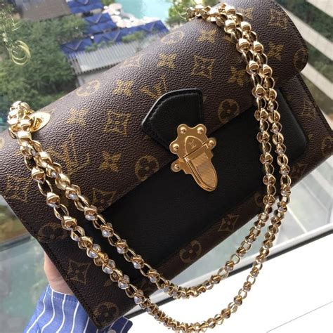 gold metallic louis vuitton bag|louis vuitton bag gold chain.